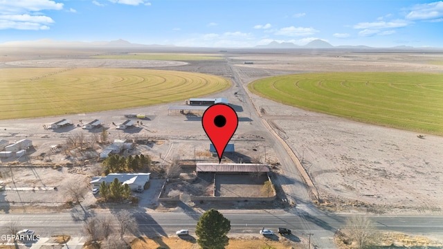 525 N Main St, Dell City, TX 79837 - aerial view of property's location with a mountainous background and rural landscape