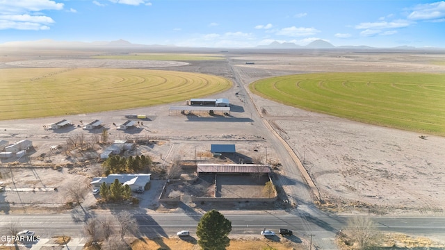 birds eye view of property featuring a mountain view