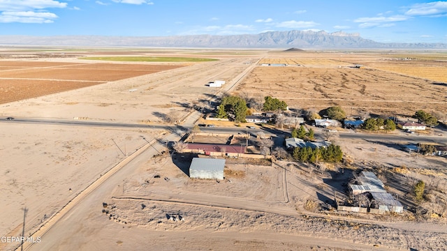 bird's eye view with a mountain view and a rural view