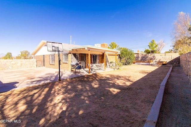 rear view of house featuring a patio area