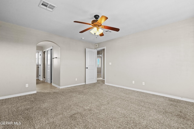 carpeted empty room with ceiling fan