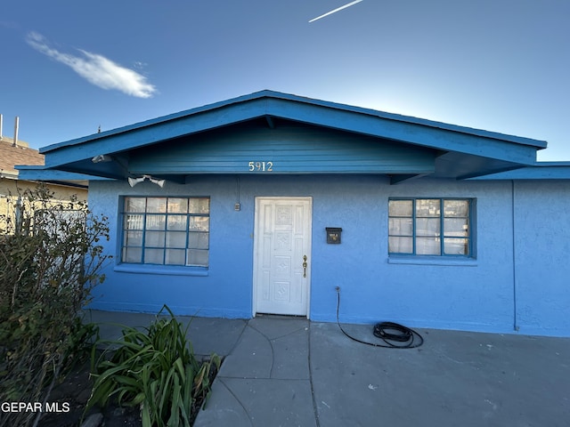 view of front of house with a patio