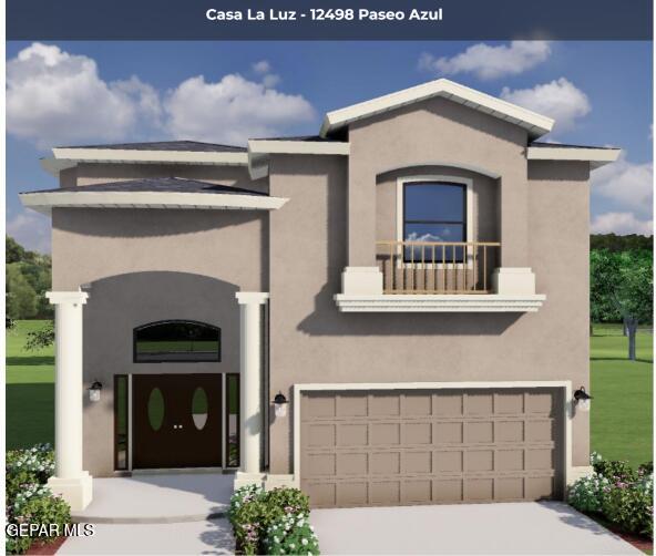 view of front of house featuring a garage and a balcony