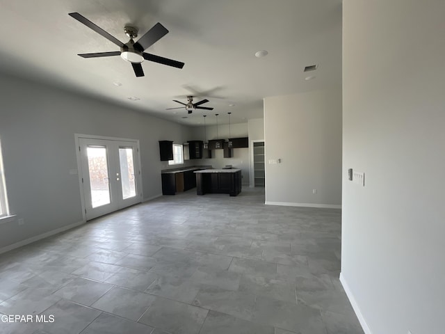 12498 Paseo Azul Dr, El Paso, TX 79928 - unfurnished living room featuring french doors, baseboards, and a ceiling fan