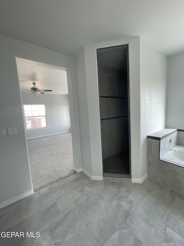 12498 Paseo Azul Dr, El Paso, TX 79928 - full bath with a bath, baseboards, and ceiling fan