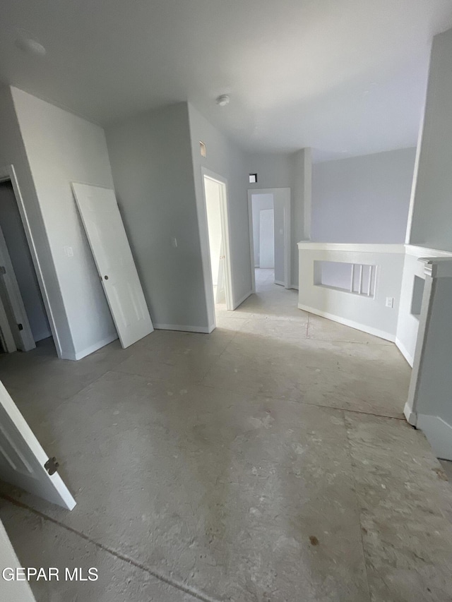 12498 Paseo Azul Dr, El Paso, TX 79928 - unfurnished living room with baseboards