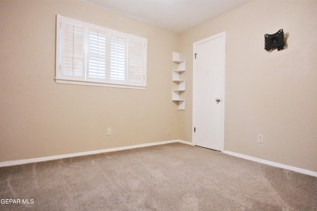 empty room with carpet floors