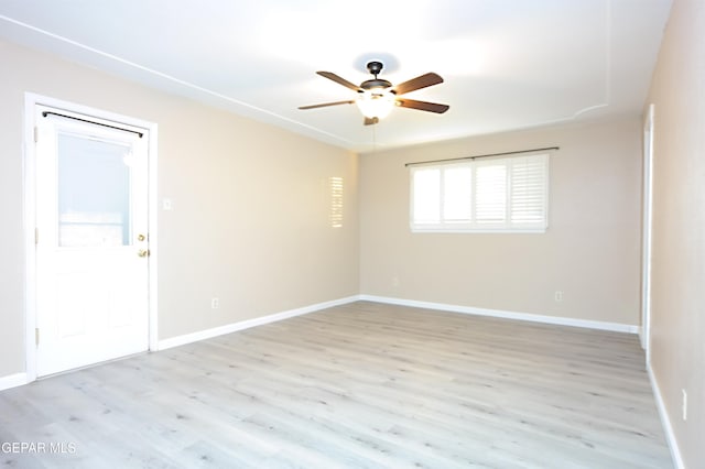 unfurnished room featuring ceiling fan and light hardwood / wood-style flooring