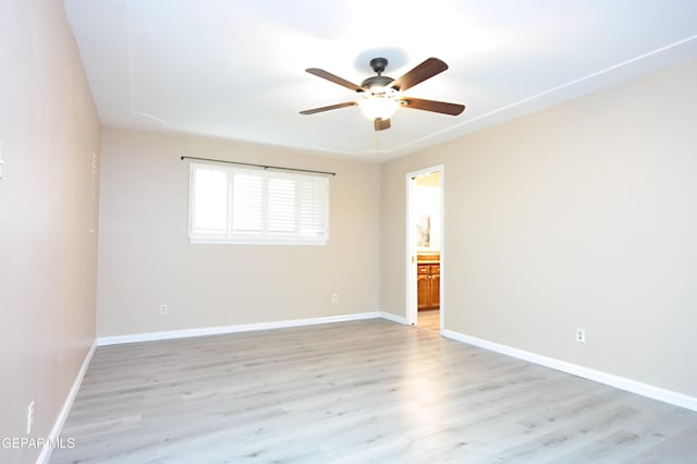 unfurnished room featuring ceiling fan and light hardwood / wood-style flooring