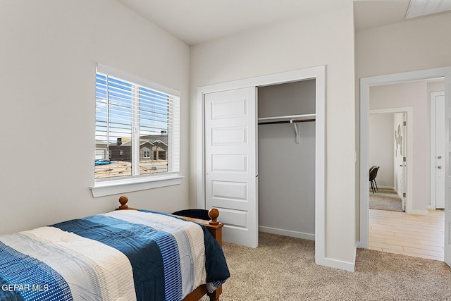 carpeted bedroom featuring a closet