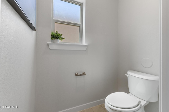 bathroom featuring toilet