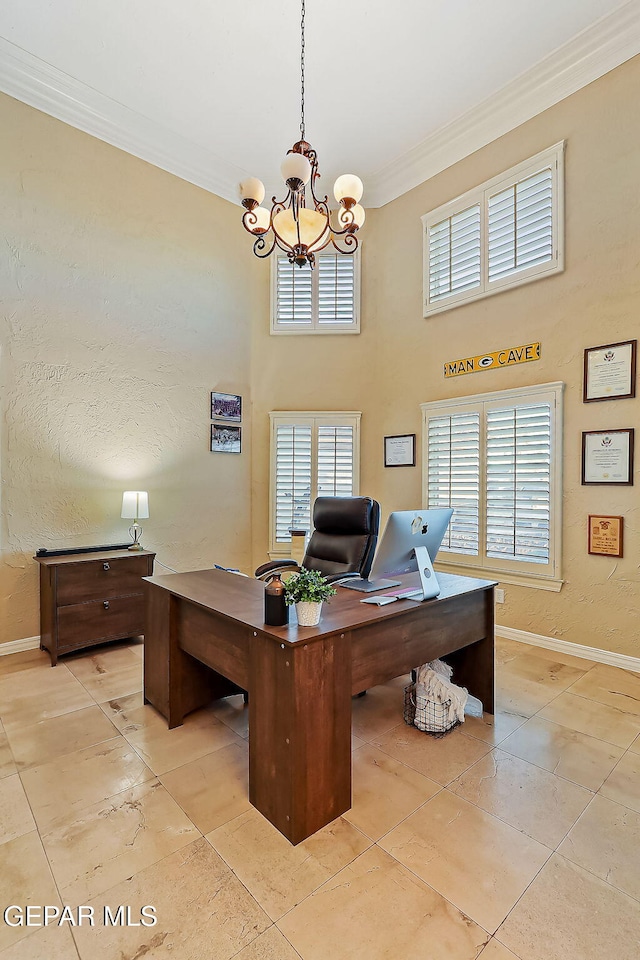 office space featuring a chandelier, light tile patterned floors, and ornamental molding