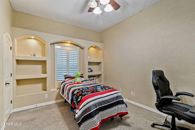 bedroom with ceiling fan and carpet floors