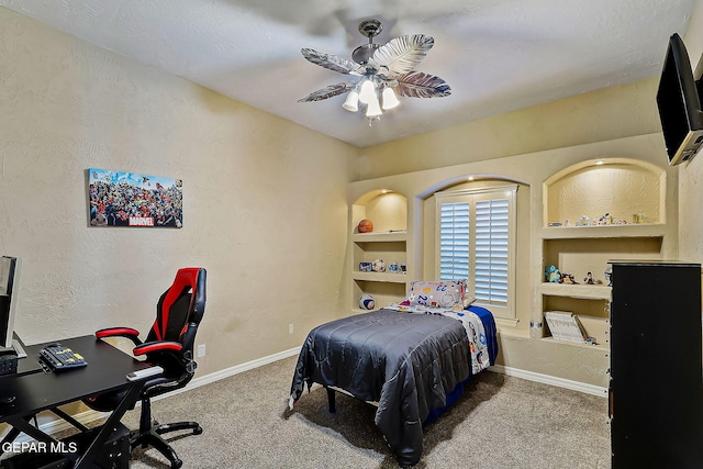 bedroom featuring ceiling fan and carpet floors