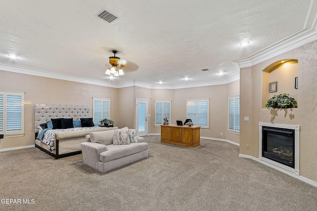 bedroom with ceiling fan, light carpet, a textured ceiling, and ornamental molding