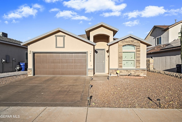 view of front of property with a garage