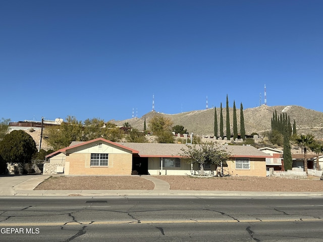 view of front of house with a mountain view