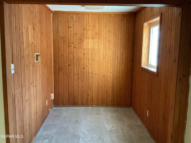 empty room with wood walls