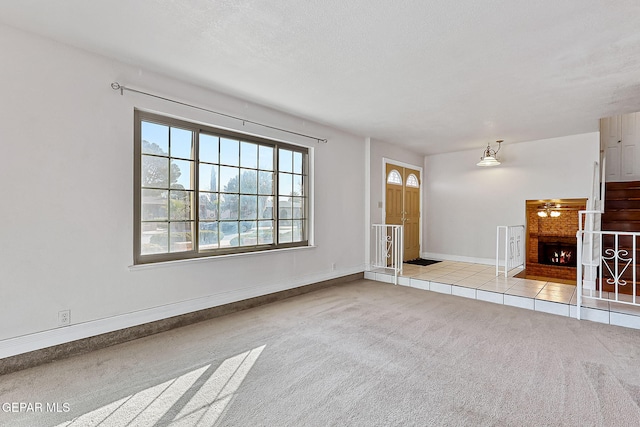 unfurnished living room with a fireplace and light colored carpet