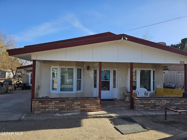 view of front of home with a patio area and covered porch