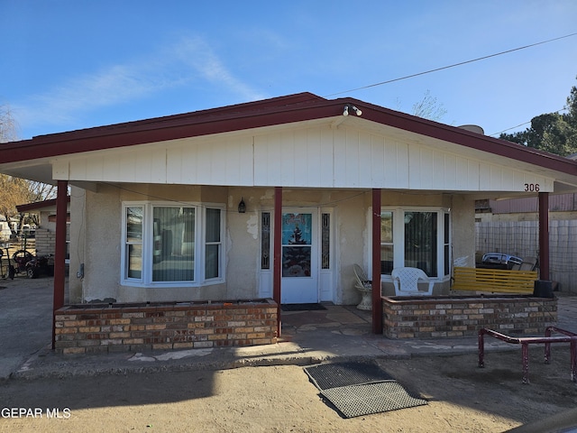 view of front of house with a patio area