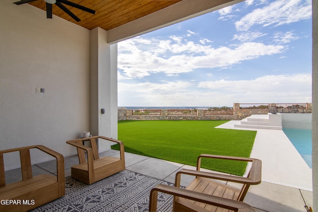 view of patio with ceiling fan