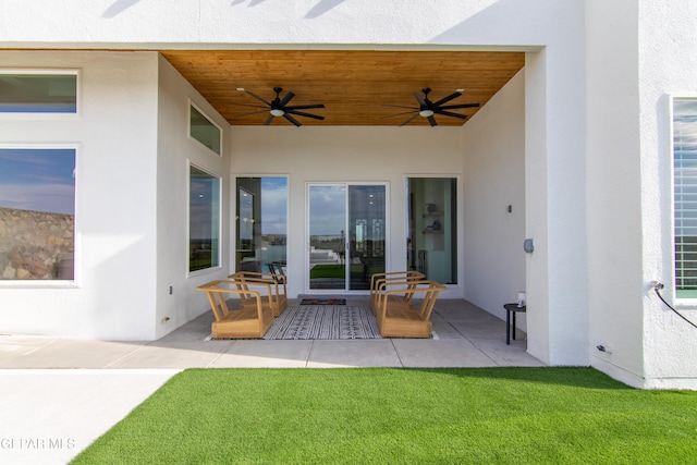 view of patio / terrace featuring ceiling fan