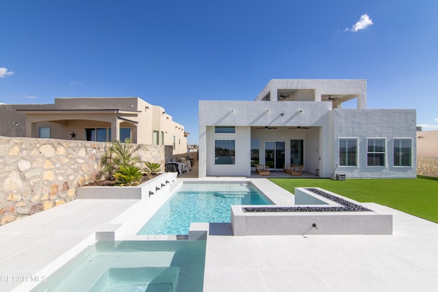 view of pool with a patio, an outdoor hangout area, ceiling fan, and a lawn