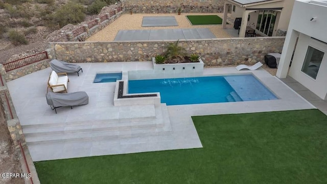 view of pool with a patio