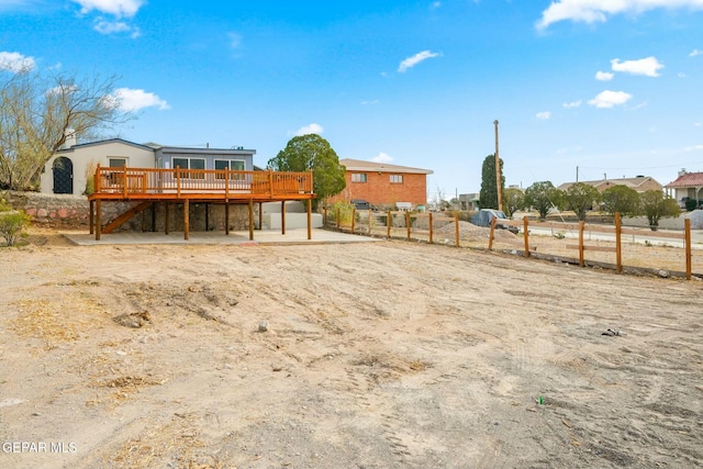 view of yard with a wooden deck