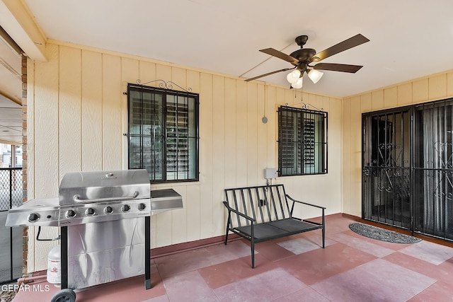 view of patio / terrace with ceiling fan and grilling area