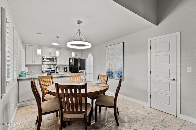 dining area with sink