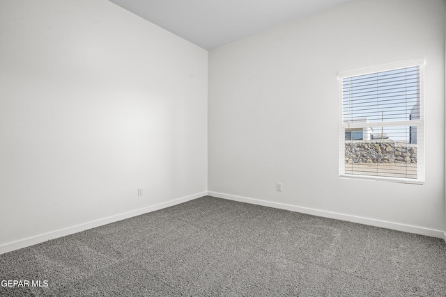 unfurnished room featuring carpet floors