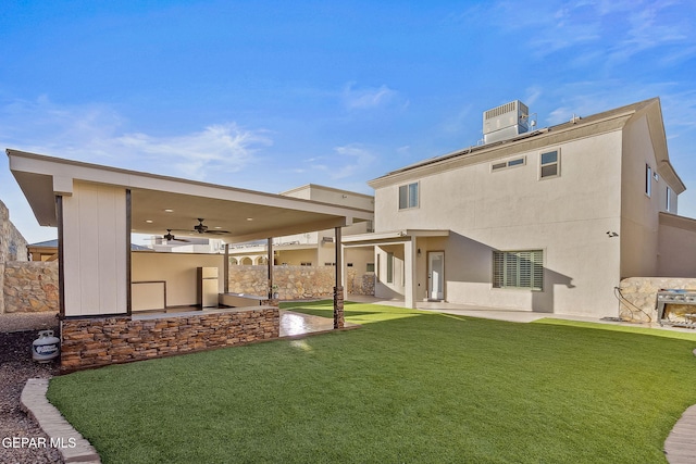 7828 Enchanted View Dr, El Paso, TX 79911 - rear view of house featuring ceiling fan, a yard, a patio area, and stucco siding