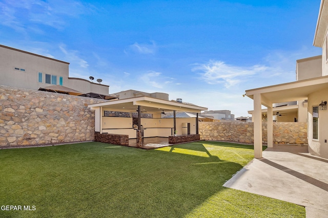 7828 Enchanted View Dr, El Paso, TX 79911 - view of yard featuring a ceiling fan and a patio area