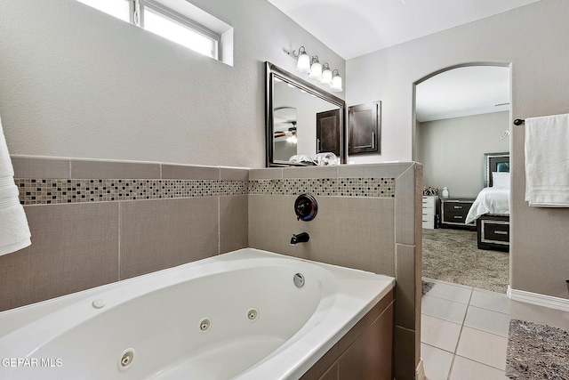 7828 Enchanted View Dr, El Paso, TX 79911 - ensuite bathroom with a jetted tub and tile patterned floors