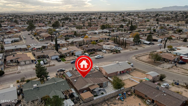 drone / aerial view featuring a mountain view