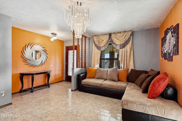 living room with a textured ceiling and an inviting chandelier