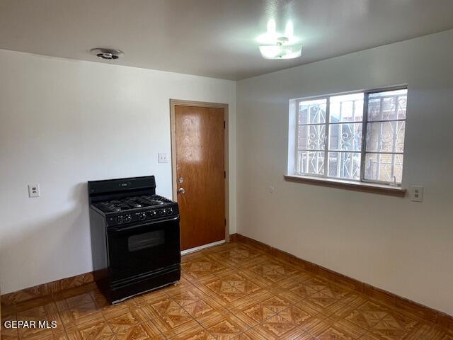 kitchen with black range with gas cooktop