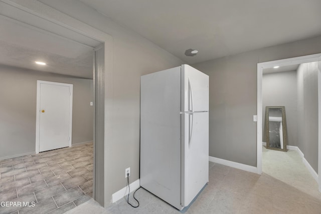 kitchen featuring white refrigerator