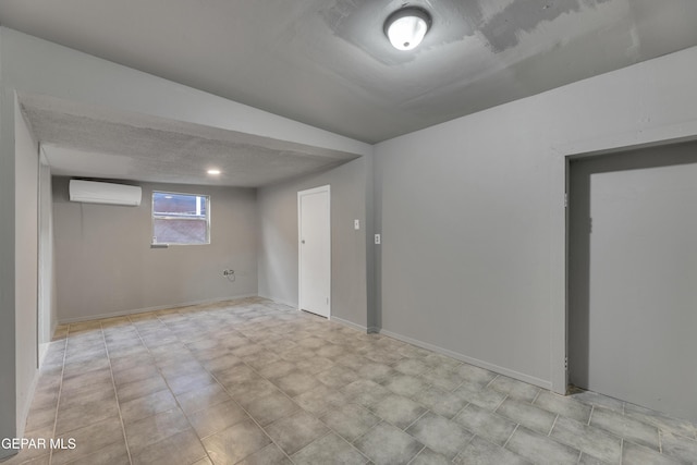 basement with a wall mounted air conditioner