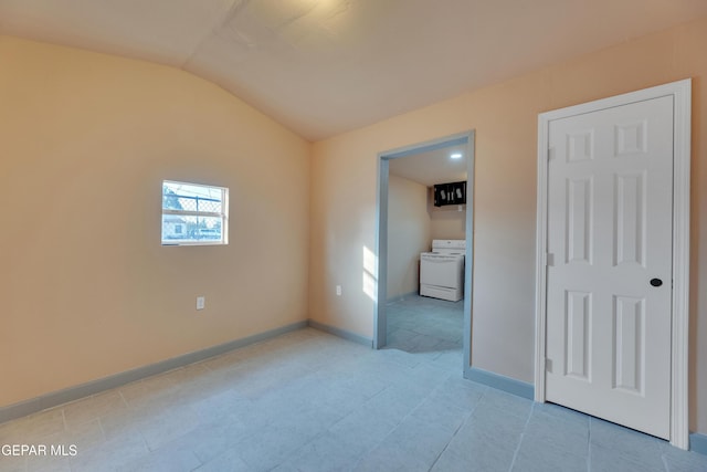 interior space with washer / dryer and lofted ceiling