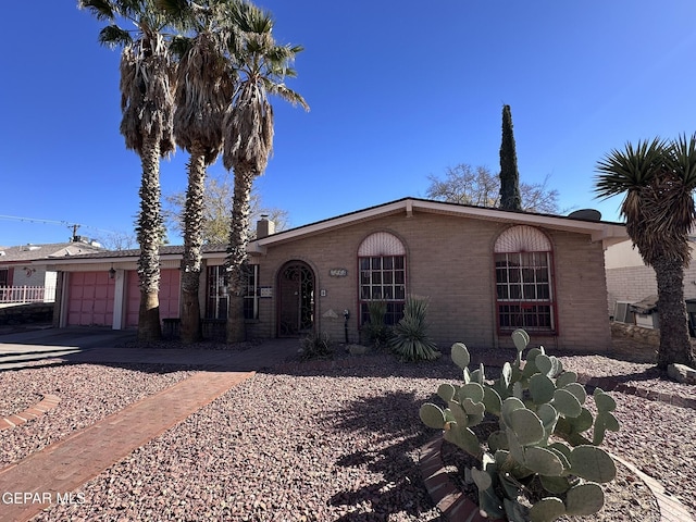 ranch-style home with a garage