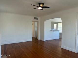 empty room featuring dark hardwood / wood-style floors and ceiling fan