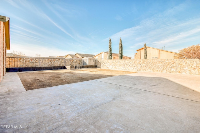 view of yard featuring basketball court