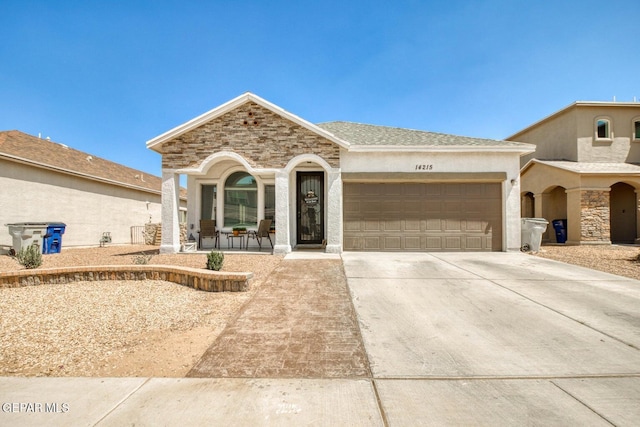 view of front of home featuring a porch and a garage