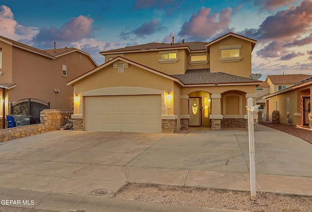 view of front of house with a garage