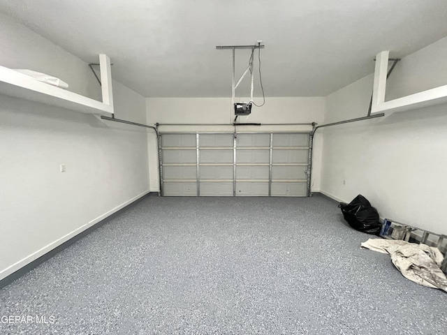 garage featuring a garage door opener