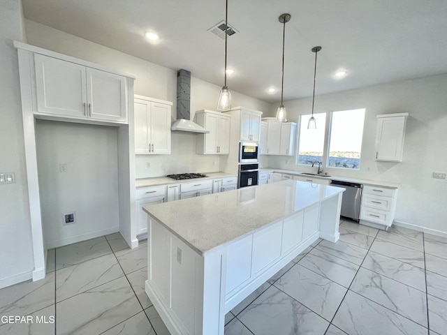 kitchen featuring dishwasher, pendant lighting, a kitchen island, wall chimney exhaust hood, and white cabinets