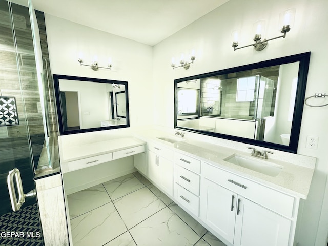 bathroom with walk in shower and vanity